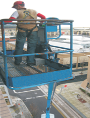 Commercial glass replacement via manlift